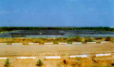 Image of Leachatecollection and evaporation pond at the common facility for waste management at Hyderabad, Andhra Pradesh